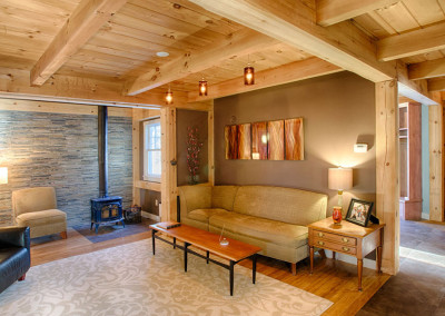 Contemporary timber frame living room with wood stove